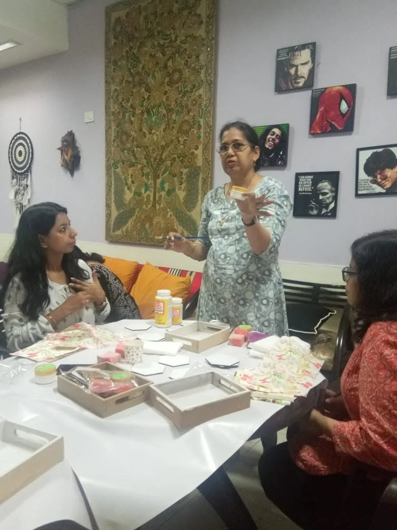Vibha guiding children through a hands-on creative activity